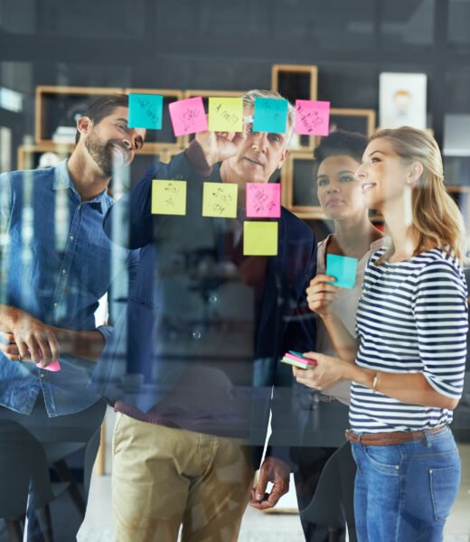 Shot of a group of colleagues having a brainstorming session in a modern office.